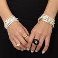 Load image into Gallery viewer, 14 Karat Yellow Gold Diamond and Onyx Art Deco Cocktail Ring
