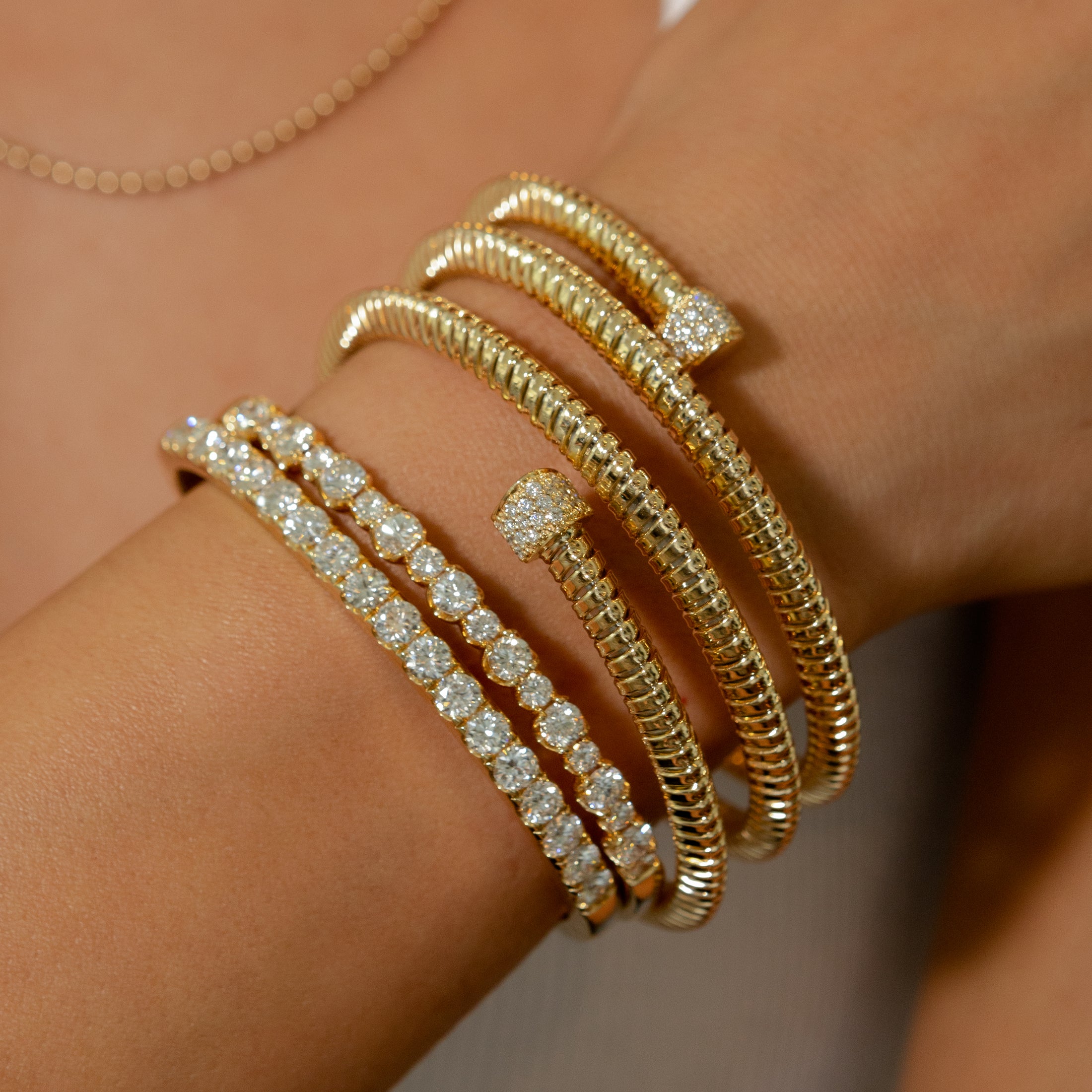 18 Karat Yellow Gold and Diamond Coil Wrap Bracelet