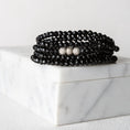 Load image into Gallery viewer, 4mm Black Crystal and White Gold Diamond Accent Seven Wrap Beaded Bracelet
