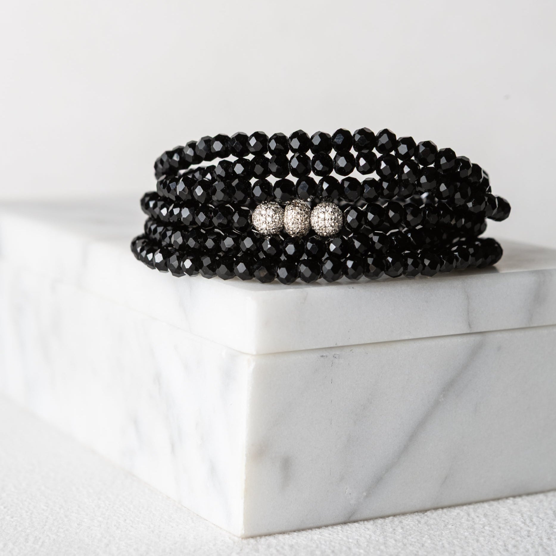 4mm Black Crystal and White Gold Diamond Accent Seven Wrap Beaded Bracelet