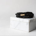 Load image into Gallery viewer, 4mm Black Crystal and Yellow Gold Diamond Accent Seven Wrap Beaded Bracelet
