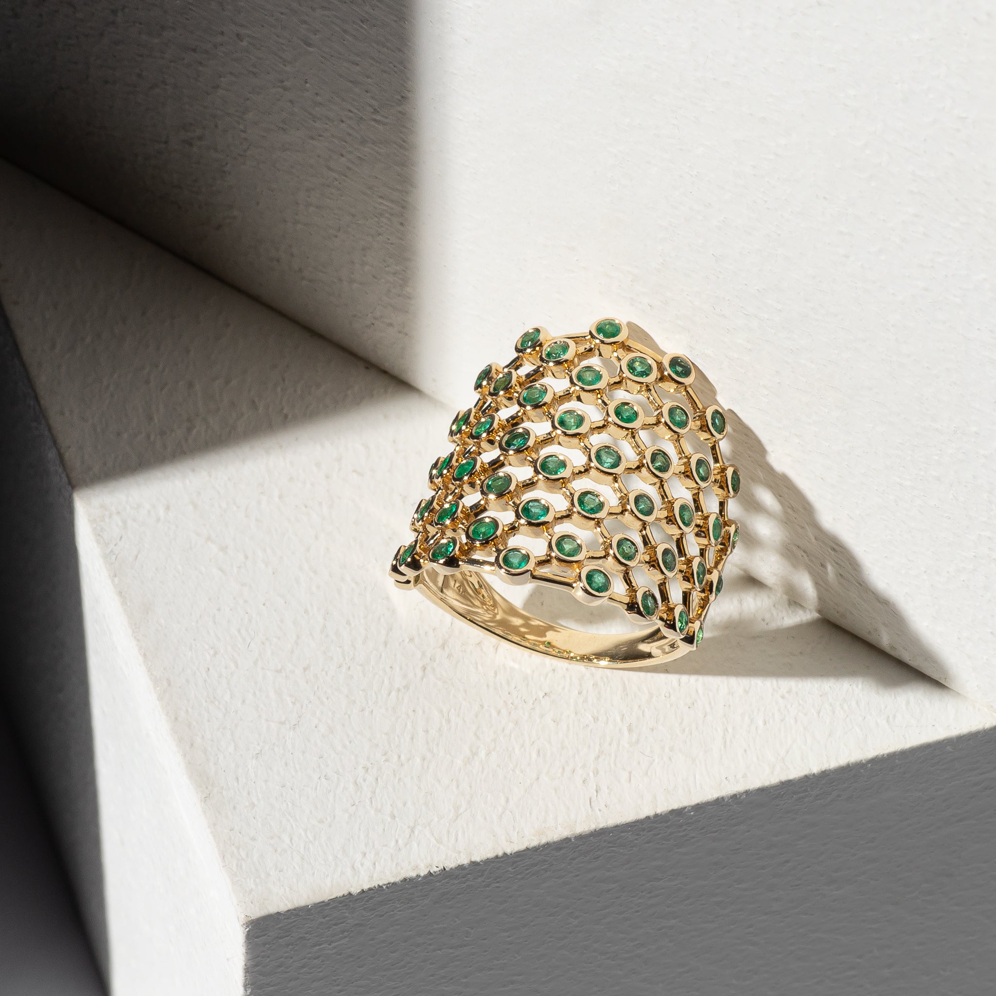 14 Karat Yellow Gold Diamond Bezel Set Emerald Ring
