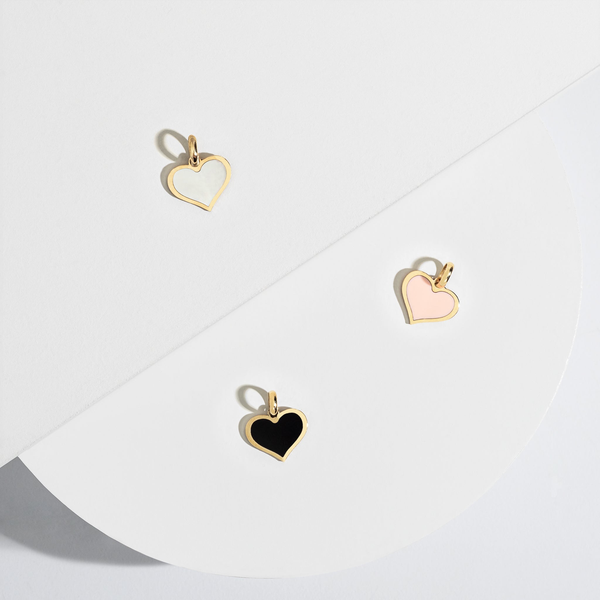 Yellow Gold and Onyx Heart Charm