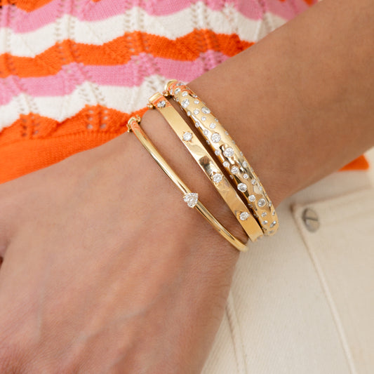 14 Karat Yellow Gold and Diamond Burst Hinge Bracelet