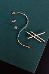 14 Karat Diamond and Turquoise Bezel Tennis Bracelet