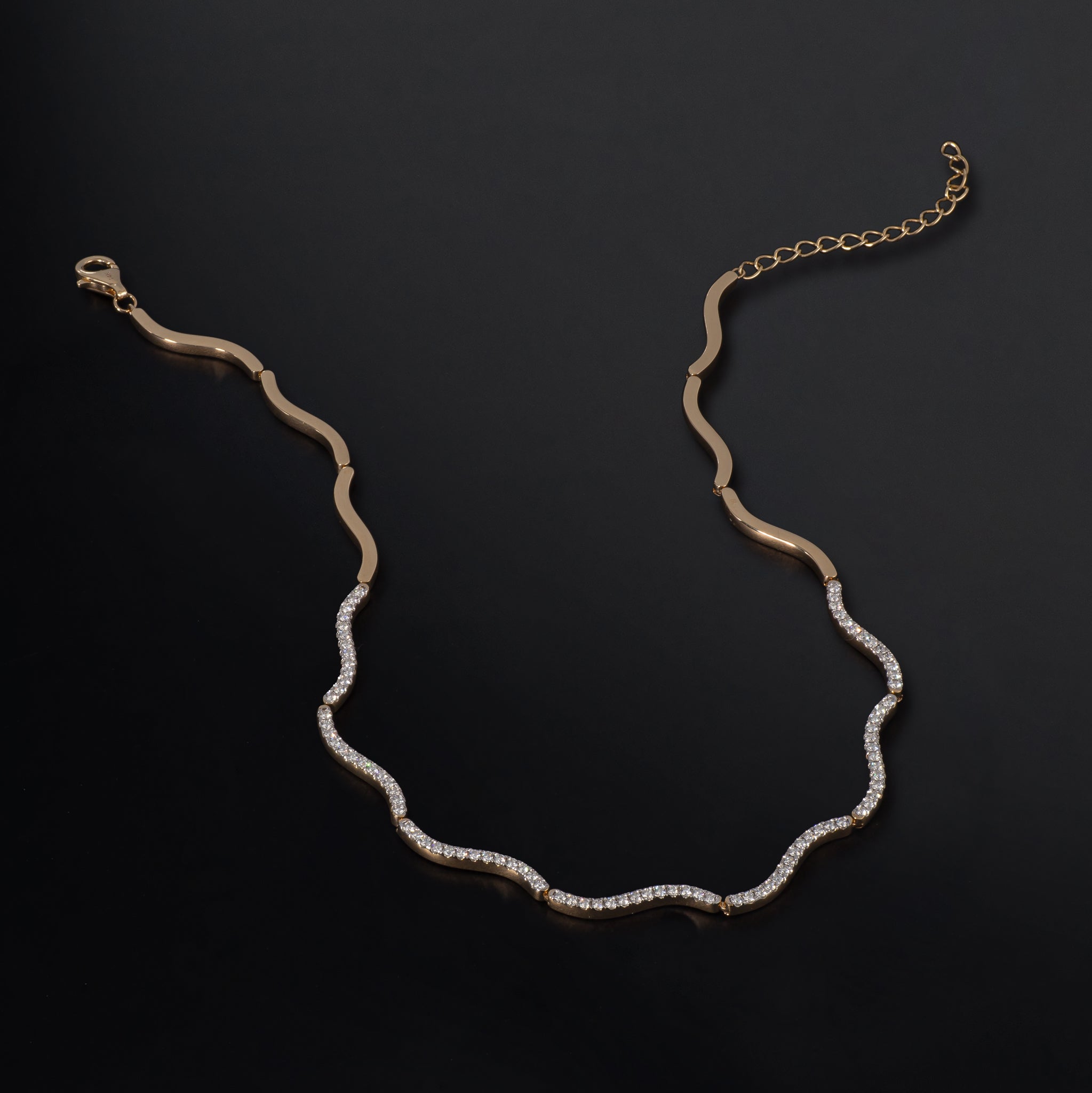 14 Karat Yellow Gold and Diamond Wave Necklace