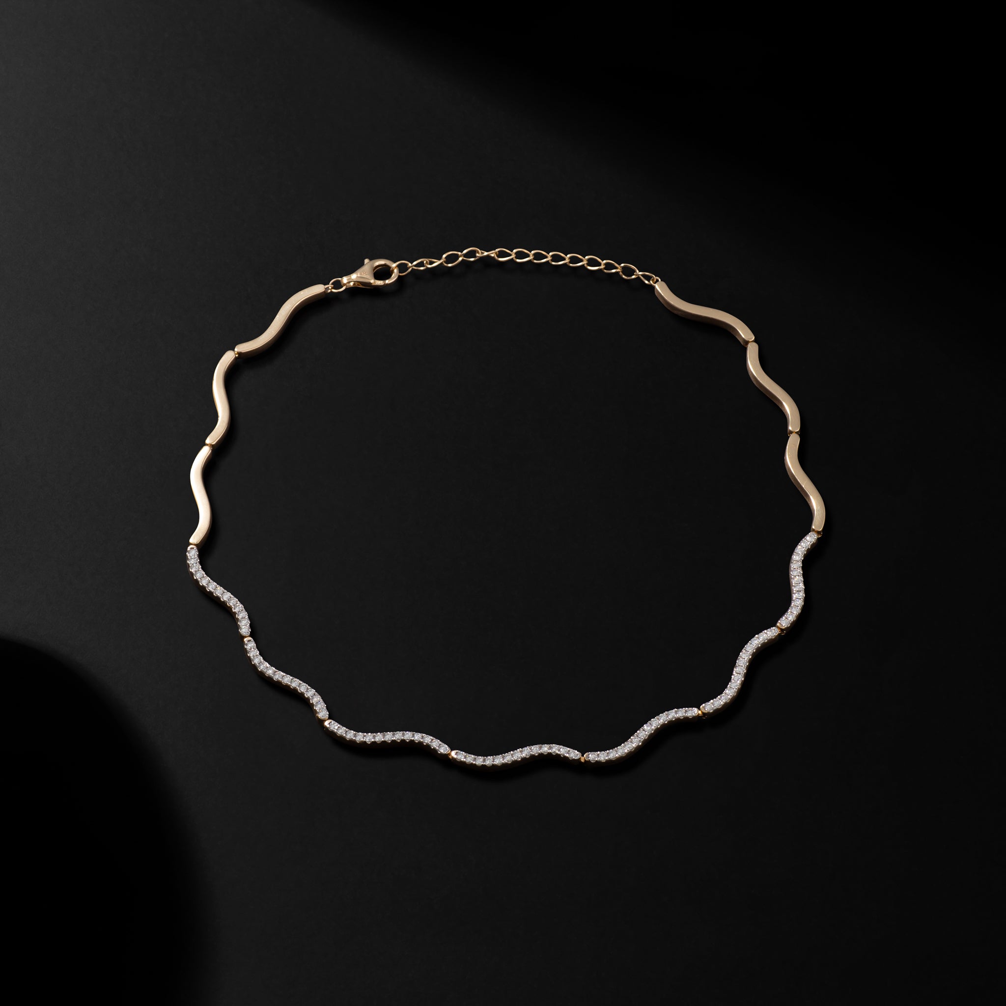 14 Karat Yellow Gold and Diamond Wave Necklace