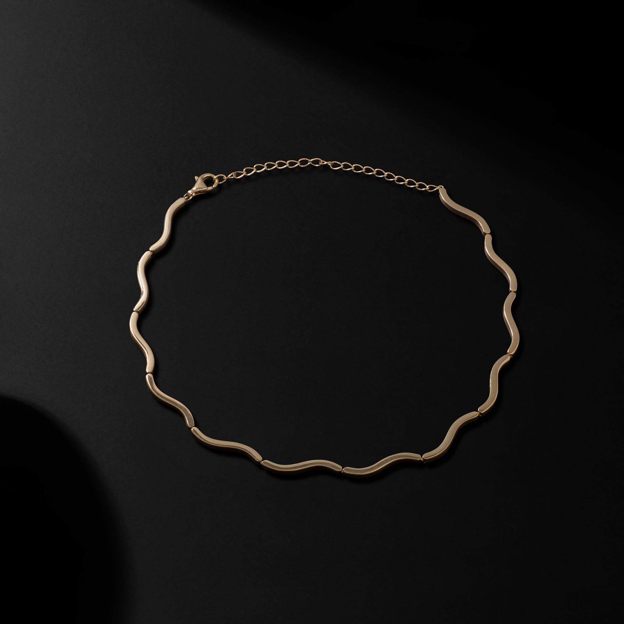 14 Karat Yellow Gold and Wave Necklace