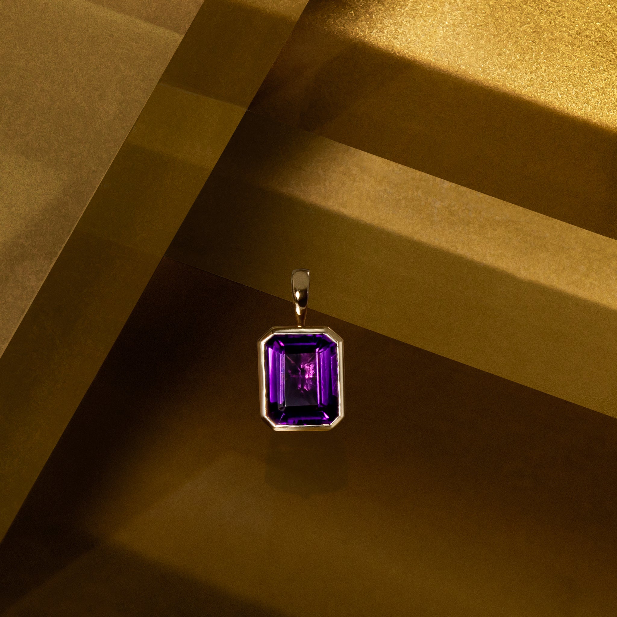 14 Karat Yellow Gold Amethyst Charm