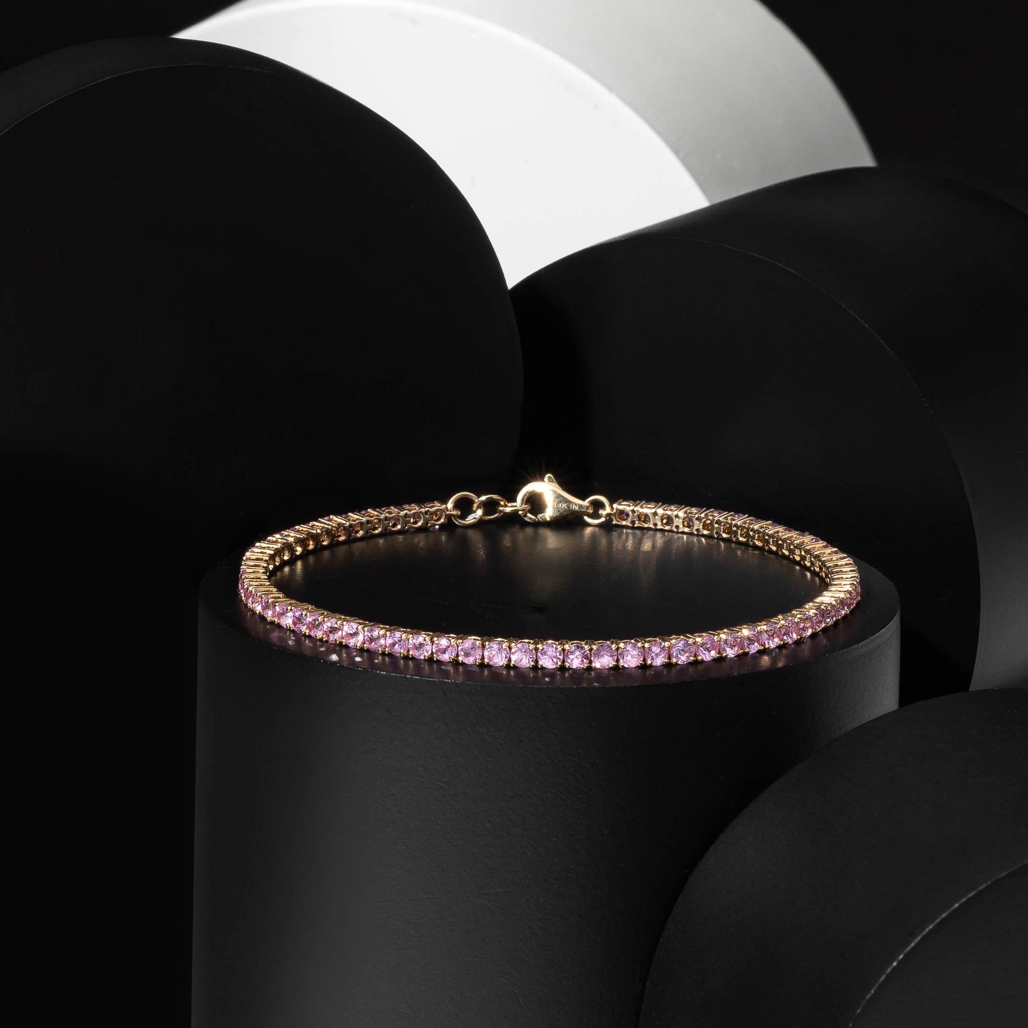 14 Karat Yellow Gold Pink Sapphire Tennis Bracelet