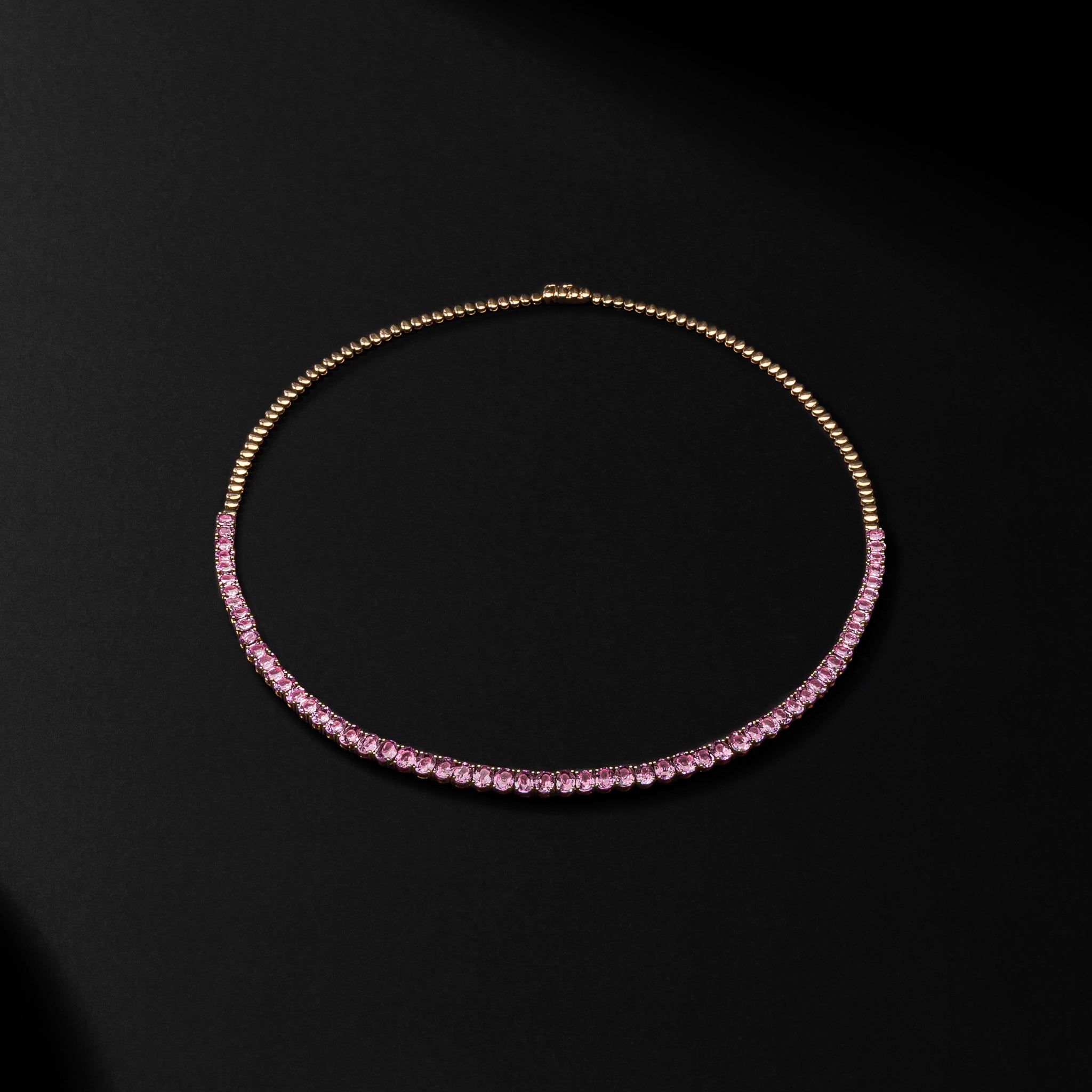 14 Karat Gold and Pink Sapphire 10.00cts Oval 16.00" Tennis Necklace