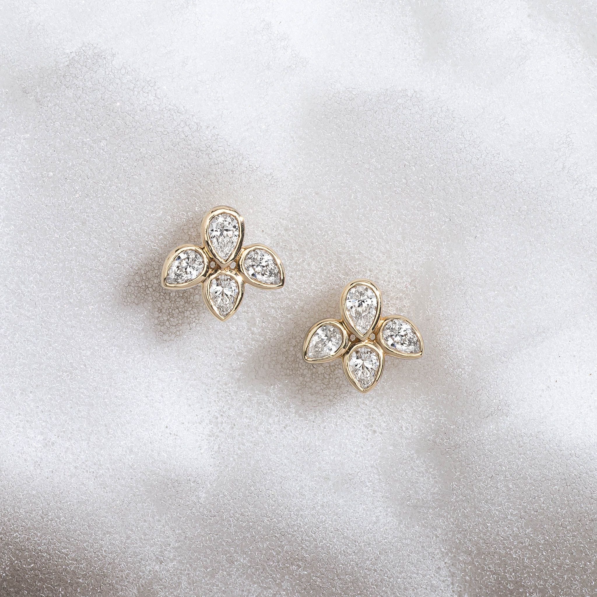 14 Karat Yellow Gold Four Diamond Pear Stud Earrings