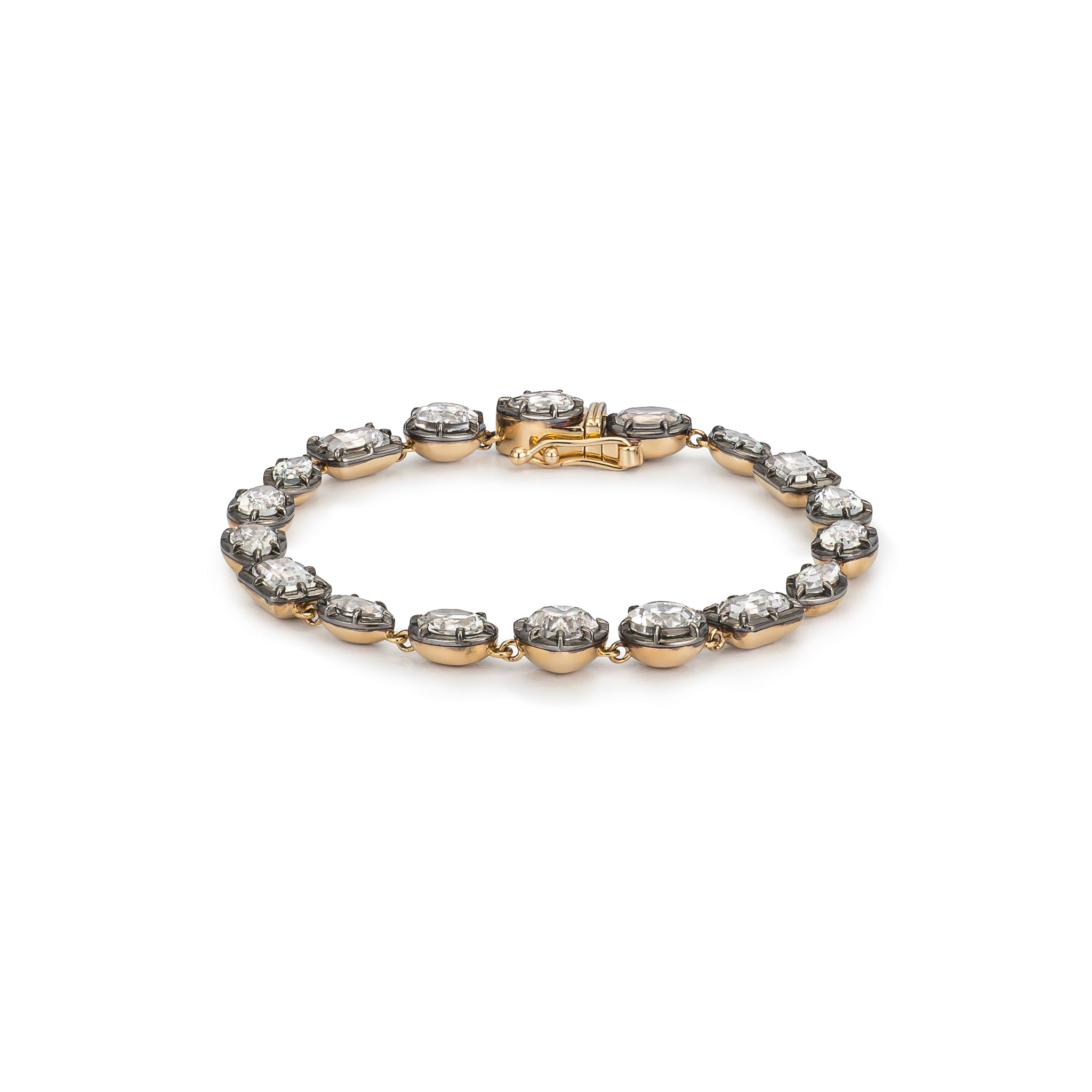 14 Karat Yellow Gold Multi Shape White Topaz and Rhodium Halo Bracelet