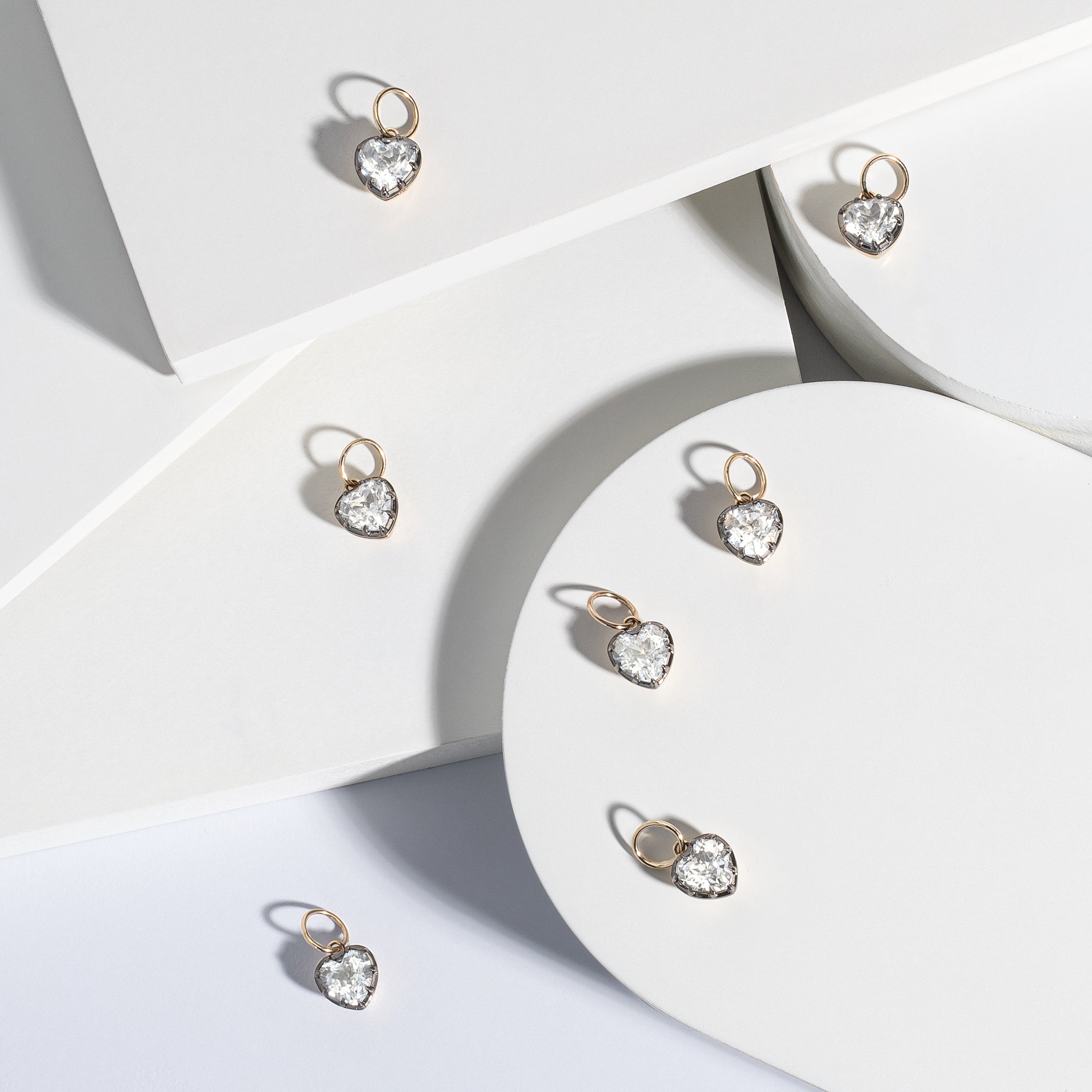 14 Karat Yellow Gold White Topaz Heart Charm