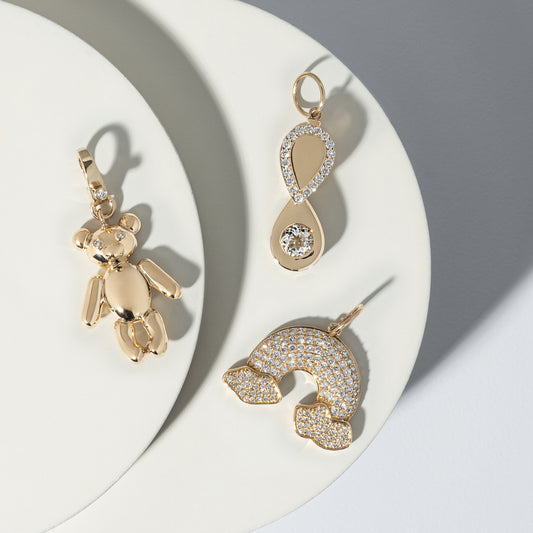 14 Karat Yellow Gold Diamond Rainbow Charm