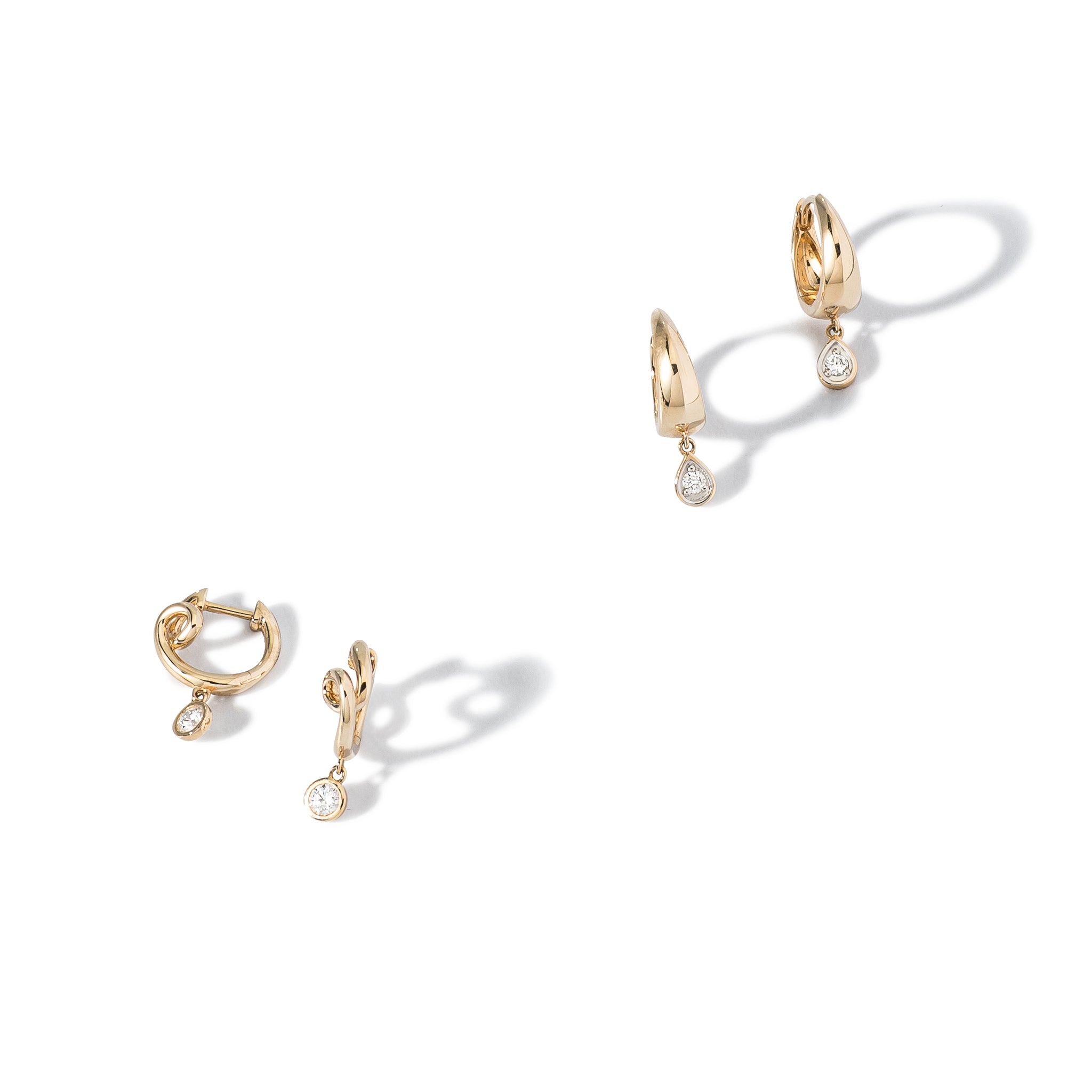 14 Karat Yellow Gold Diamond Pear Drop Huggie
