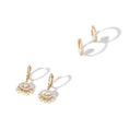 Load image into Gallery viewer, 14 Karat Yellow Gold Diamond Inside Pearl Huggie

