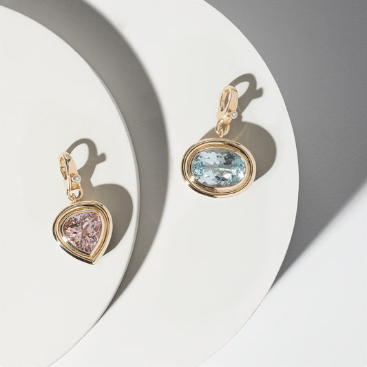 14 Karat Yellow Gold and Blue Topaz Oval Clip Charm