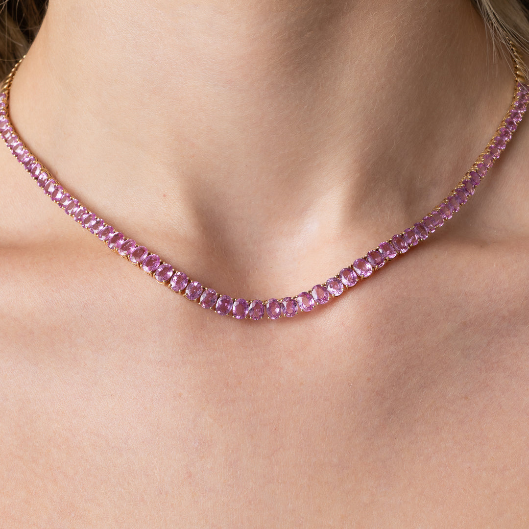 14 Karat Gold and Pink Sapphire 10.00cts Oval 16.00" Tennis Necklace