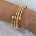 Load image into Gallery viewer, 18 Karat Yellow Gold and Diamond Coil Wrap Bracelet
