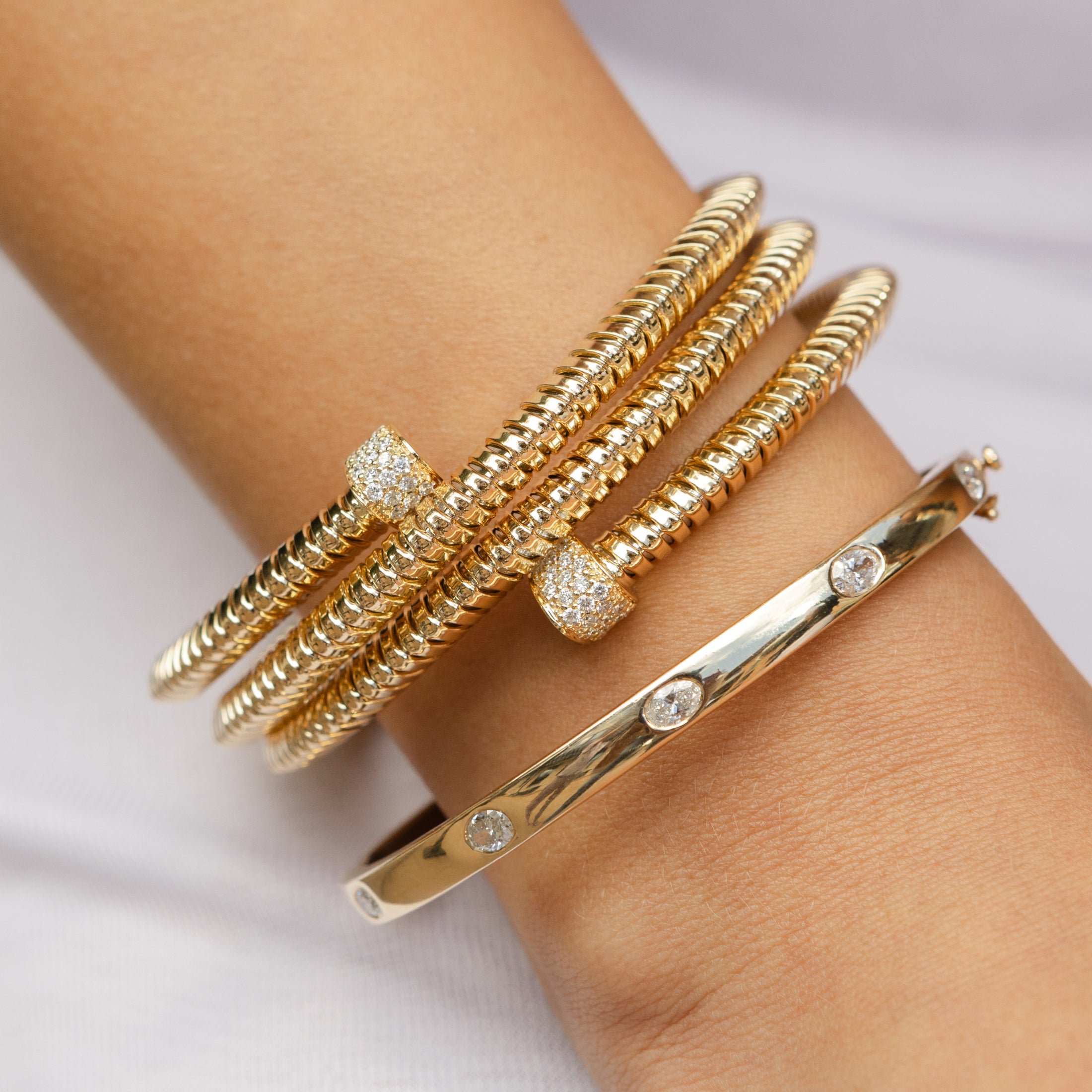 18 Karat Yellow Gold and Diamond Coil Wrap Bracelet