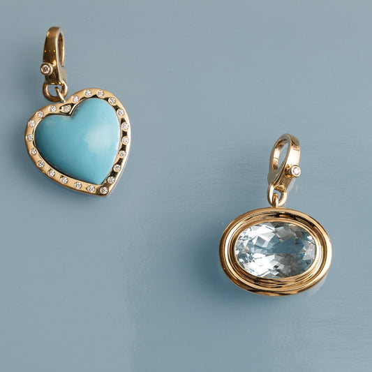 14 Karat Yellow Gold and Blue Topaz Oval Clip Charm