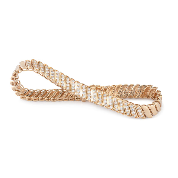 14 Karat Yellow Gold and Diamond Wave bracelet