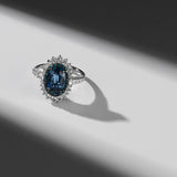 18 Karat White Gold and Blue Sapphire Diamond Ring