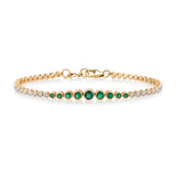 14 Karat Yellow Gold Diamond and Emerald Bezel Tennis Bracelet