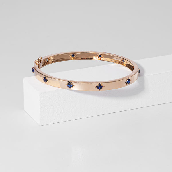 14 Karat and Blue Sapphire Burst Hinge Bracelet