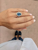 18 Karat White Gold and Blue Sapphire Diamond Ring