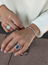 18 Karat White Gold and Blue Sapphire Diamond Ring
