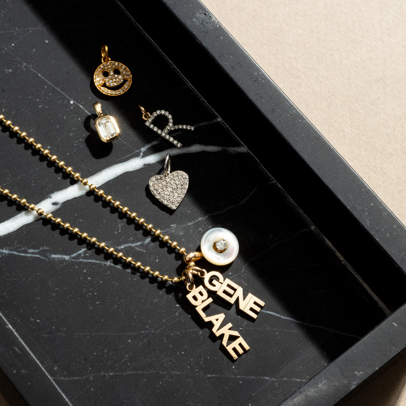 Yellow Gold and Bezel Set Diamond Charm