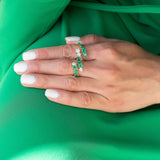 14 Karat Gold Emerald and Diamond Graduating Ring
