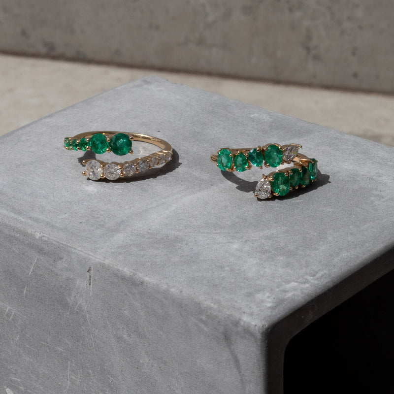 14 Karat Gold Emerald and Diamond Graduating Ring