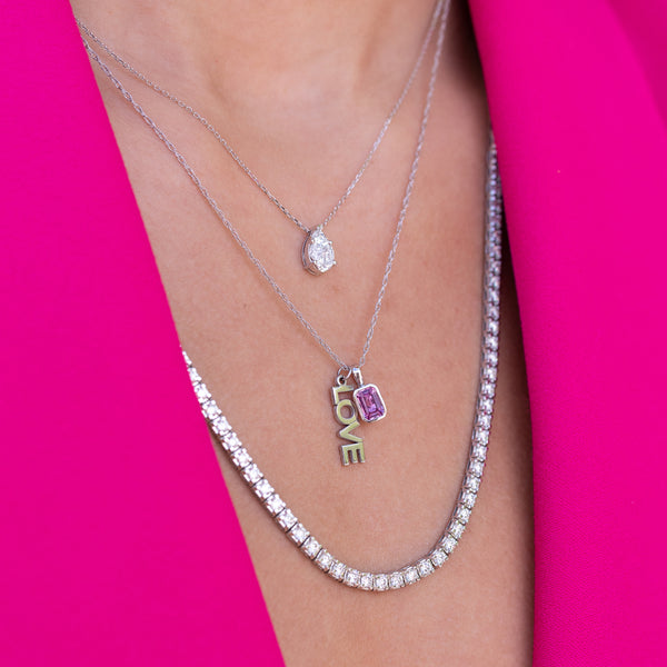 White Gold and Bezel Set Pink Sapphire Charm
