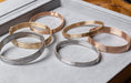 Load image into Gallery viewer, 14 Karat Rose Gold Three Band Stacked Cuff Bracelet
