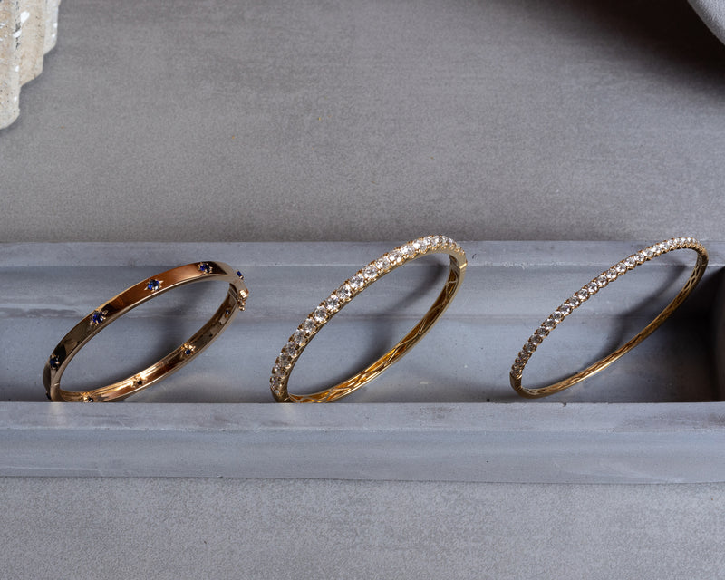 14 Karat and Blue Sapphire Burst Hinge Bracelet
