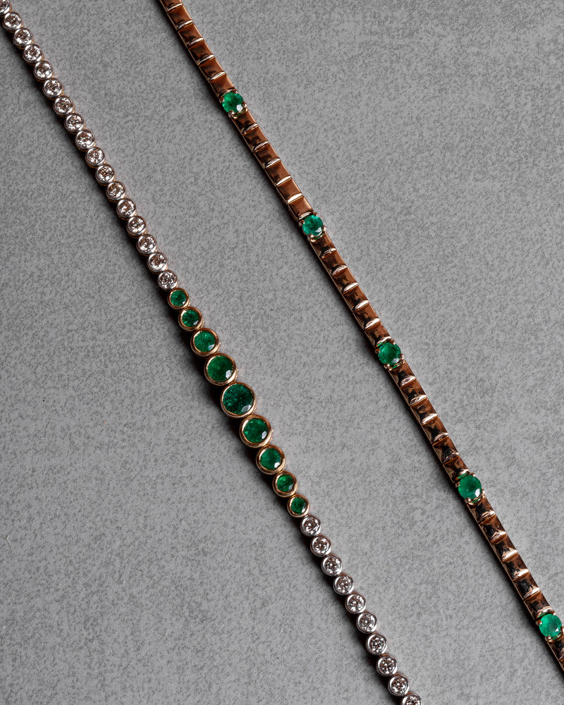 14 Karat Yellow Gold Diamond and Emerald Bezel Tennis Bracelet