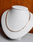 Load image into Gallery viewer, 14 Karat Alternating Bezel Diamond Emerald Tennis Necklace
