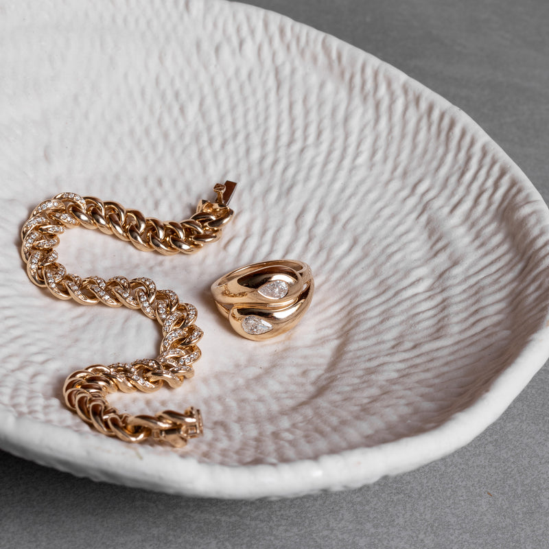 14 Karat Yellow Gold Diamond Pear Twist Ring