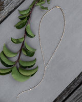 14 Karat Yellow Gold Lariat Diamond Bezel Necklace