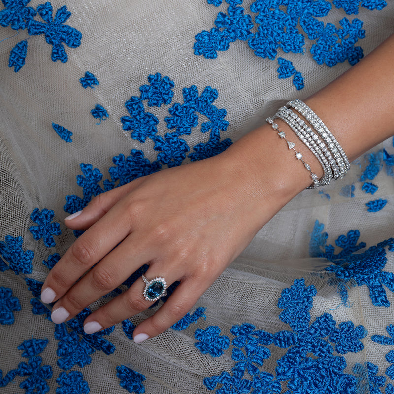 18 Karat White Gold and Blue Sapphire Diamond Ring