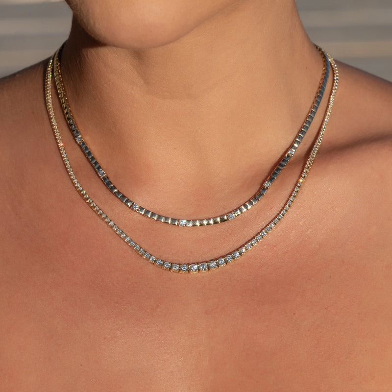 14 Karat Yellow Gold Seven Round Diamond Tennis Necklace