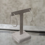 18 Karat White Gold Diamond Oval Hoops